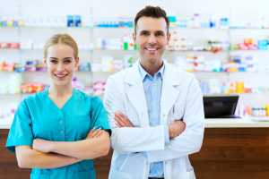 female and male pharmacists in pharmacy