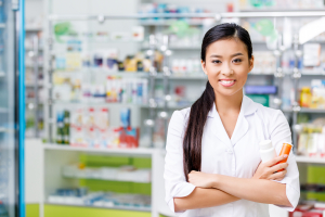 pharmacist with medication smiling